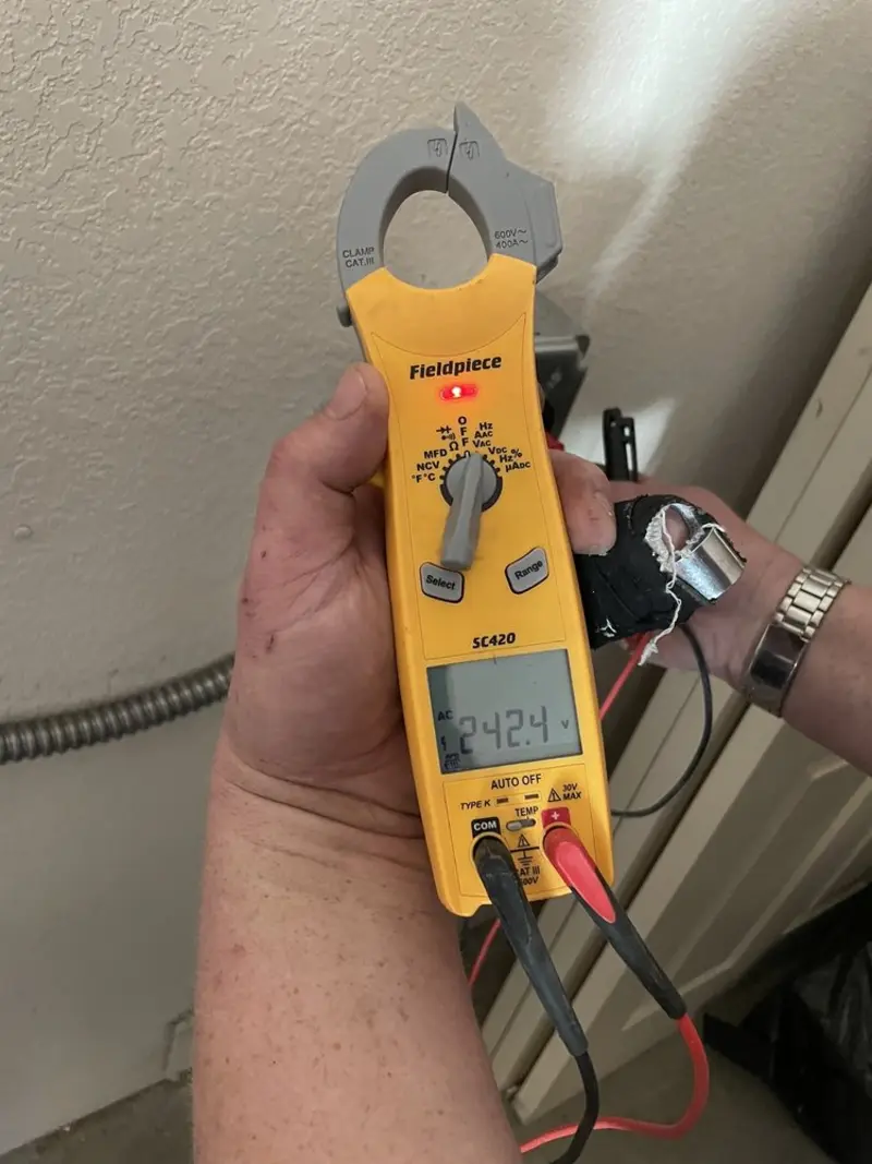Voltage testing with clamp meter during Hot Tub / Pool Electrical Wiring in Minneapolis